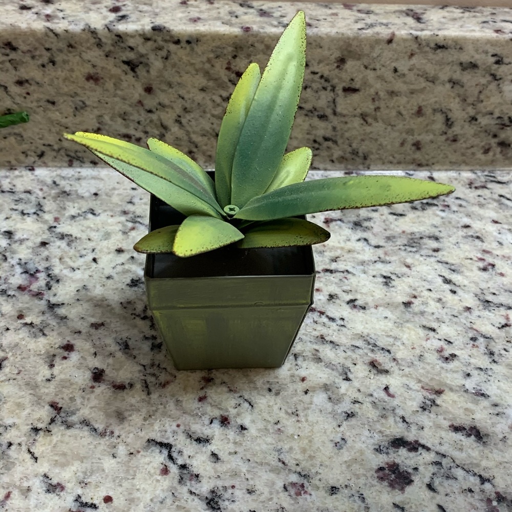 Faux metal plant